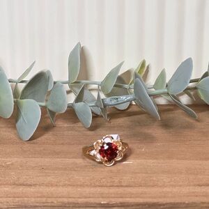 Gold Cubic Zirconia Ring with Red Gemstone Floral Accent